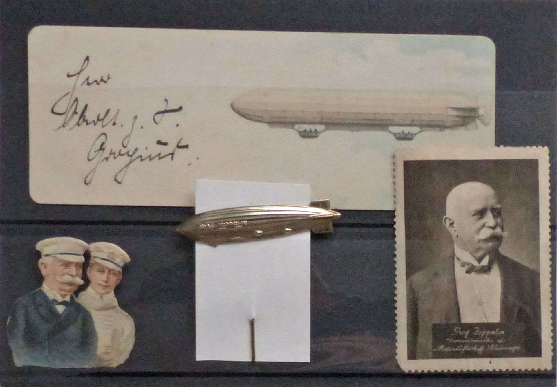 Zeppelin Lot mit 1 Visitenkarte 1 Vignette 1 Oblate und 1 Anstecknadel I-II