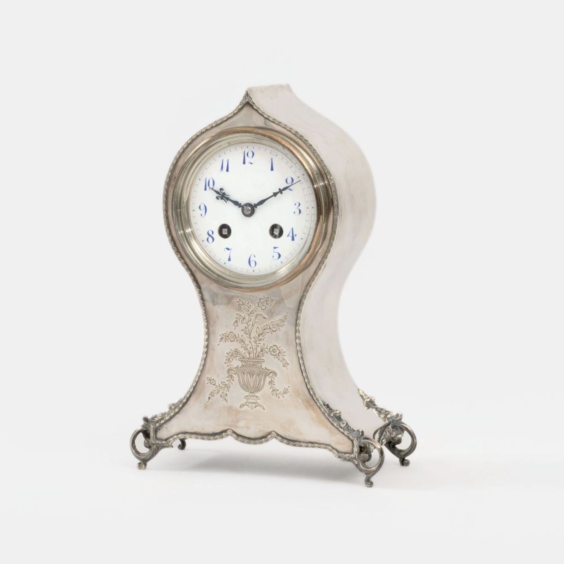 Comyns & Sons, William reg. since 1890. A Table Clock.
