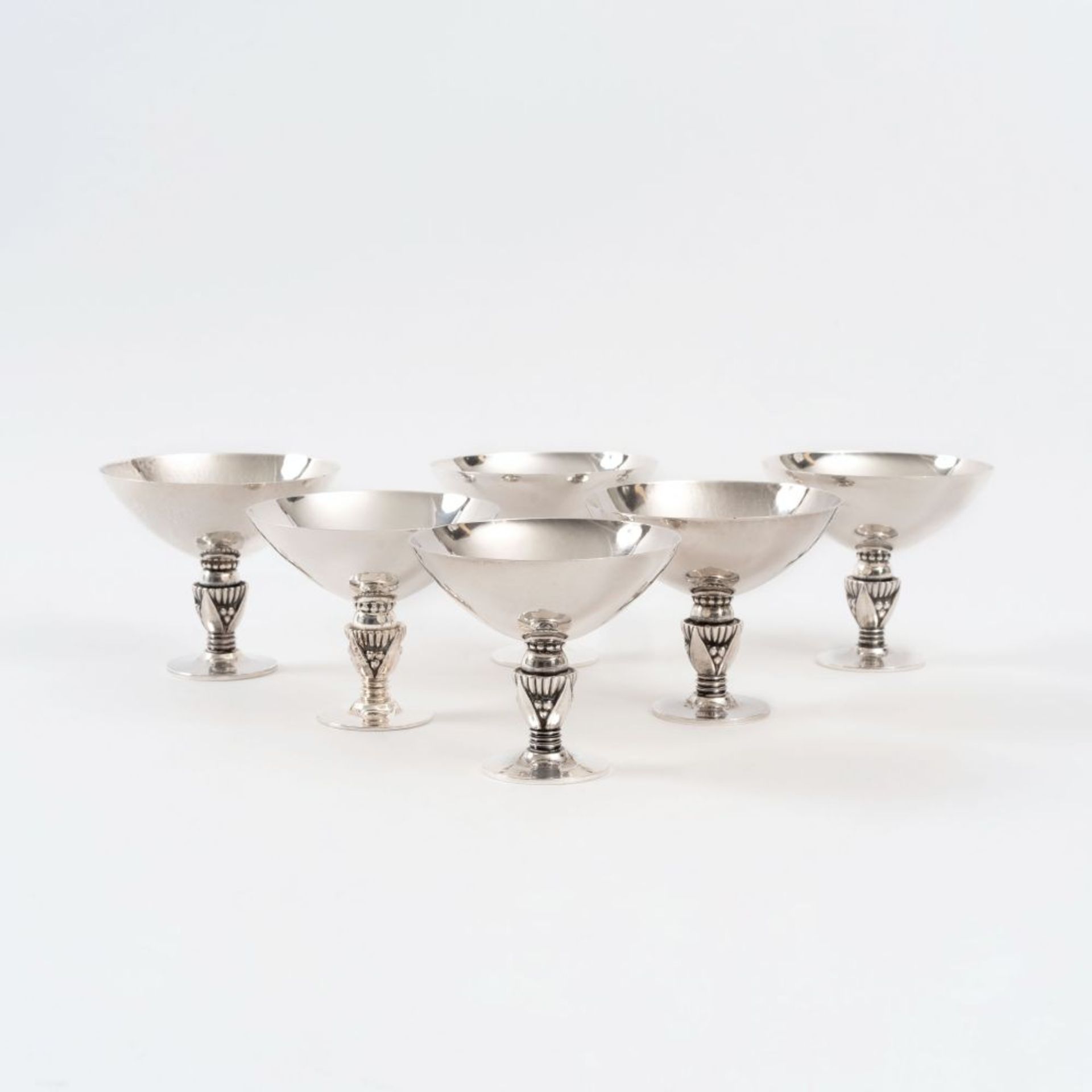 Jensen, Georg (Kopenhagen 1866 - Hellerup/Kopenhagen 1935). A Set of 6 Cocktail Bowls.