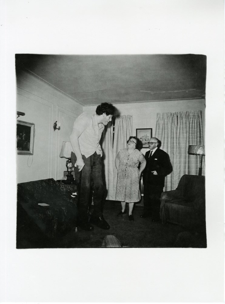 DIANE ARBUS - Jewish Giant at Home with His Parents in the Bronx, New York - Original photogravure