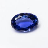 AN UNMOUNTED CERTIFIED OVAL-CUT TANZANITE, 4.490 CARATS