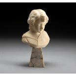 AN ALABASTER BUST OF A BOY