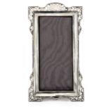 A VICTORIAN SILVER FRAME, WILLIAM COMYNS, LONDON, 1894