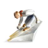 A HEREND PORCELAIN FIGURE OF A SKIER, 1940s