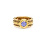 A TANZANITE RING, THEO FENNELL