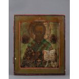 A RUSSIAN TEMPERA ON WOOD ICON OF ST NICHOLAS