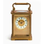 A BRASS CARRIAGE CLOCK