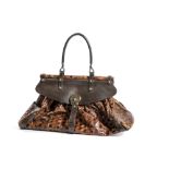 A RARE FENDI EMBOSSED TORTOISE SHELL MAGIC BAG