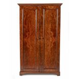 A GEORGE III STYLE WALNUT WARDROBE