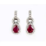 A PAIR OF RUBY AND DIAMOND EARRINGS