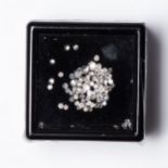 A PARCEL OF UNMOUNTED DIAMONDS