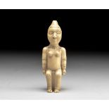 AN IVORY FIGURE, POSSIBLY YOMBE, DEMOCRATIC REPUBLIC OF THE CONGO, EARLY 20TH CENTURY