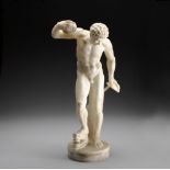 AN ALABASTER FIGURE OF A MUSICAL SATYR