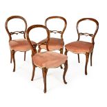 A SET OF FOUR VICTORIAN WALNUT CHAIRS