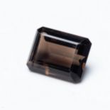 AN UNMOUNTED EMERALD-CUT SMOKY QUARTZ