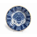 A DUTCH DELFT BLUE AND WHITE ''FLORAL BOUQUET' DISH