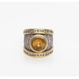 A CITRINE AND DIAMOND RING