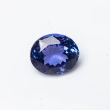 A CERTIFIED UNMOUNTED OVAL-CUT TANZANITE, 1.413 CARATS