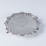 GEORGE III CIRCULAR SILVER WAITER Thomas Hannam & John Crouch, with shaped shell and scroll rim,