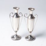 A PAIR OF SILVER TWO-HANDLED BUD VASES Makers mark SML, Birmingham 1912, the slender vase-shaped