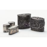 A SET OF CHINESE WHITE METAL OPIUM BOXES Each decorated with figures in a landscape setting the