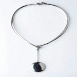 A SILVER COLLAR NECKLACE - GEORG JENSEN The flat worked necklace with links and oval drop pendant,