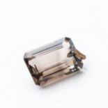 AN EMERALD-CUT GEMSTONE PENDANT Possibly topaz, approximately 12 carats