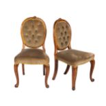 A PAIR OF VICTORIAN WALNUT SIDECHAIRS, CIRCA 1880 The oval frames with scroll cresting, the buttoned