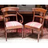 A SET OF TWELVE MAHOGANY DINING CHAIRS With two armchairs in regency style with rounded top rail and