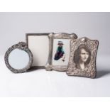 A COLLECTION OF PICTURE FRAMES  Various shapes and sizes , silver 20th