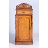A FRUITWOOD DINING ROOM PEDESTAL CUPBOARD The square top with a scroll-carved back panel above a
