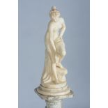 AN ALABASTER FIGURE OF A SEMI-CLAD MAIDEN, EARLY 20TH CENTURY Raised on a separate marble plinth