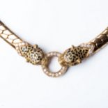 A GOLD CARTIER-STYLE LEOPARD NECKLACE Pavé-set to center with 0,60 carats of round brilliant-cut