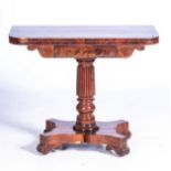 A VICTORIAN WALNUT FOLDOVER CARD TABLE, CIRCA 1850 The swivel top with rounded corners, a baize