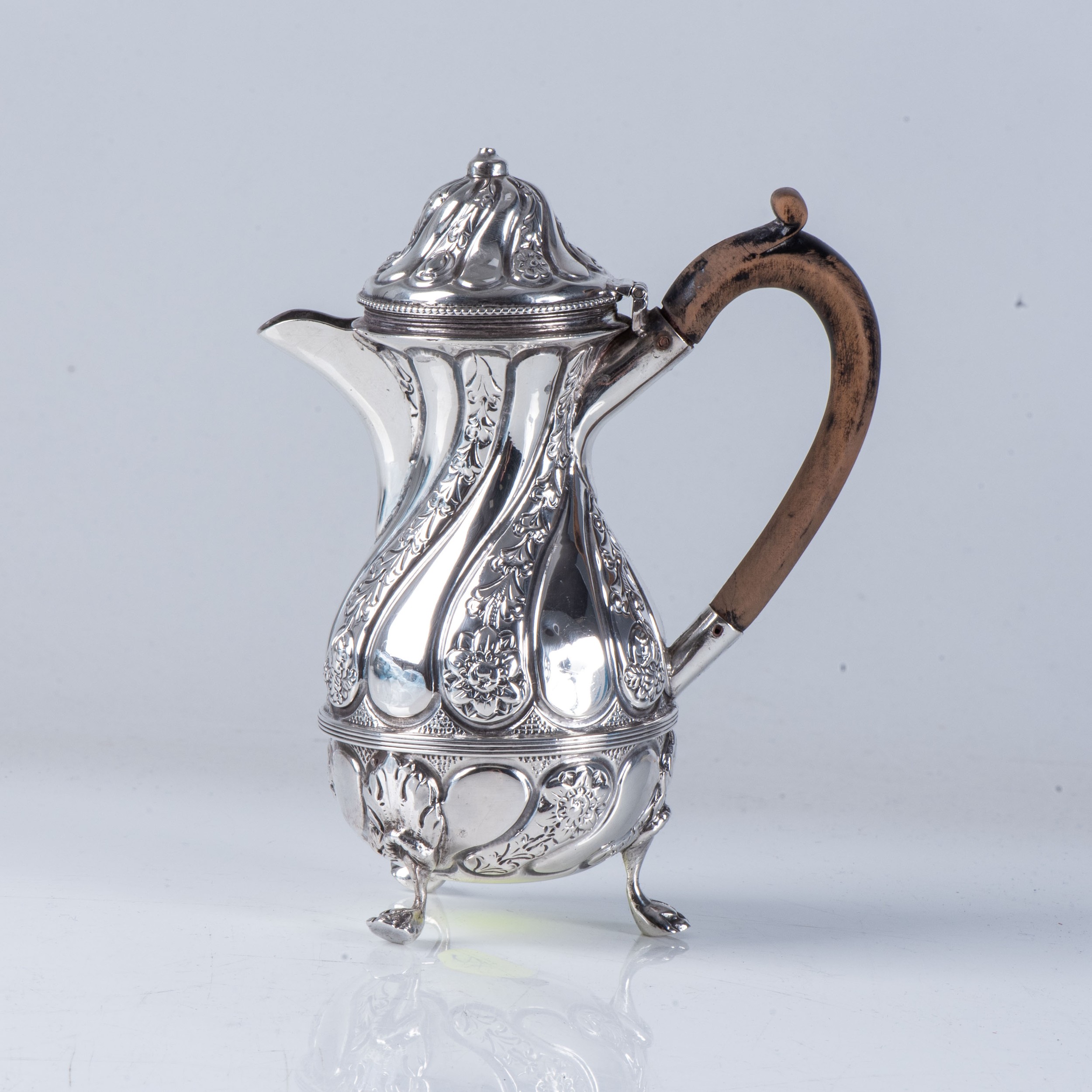 LATE VICTORIAN SILVER HOT MILK JUG Nathan & Hayes, Chester 1895, the baluster body chased with