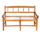 A CAPE PINE RIEMPIE BENCH, LATE 19TH CENTURY With double cross bars united by shaped square