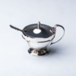 A LATE VICTORIAN SILVER MUSTARD POT AND SALT SPOON  The mustard Ollivant & Botsford, London 1922,