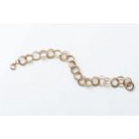 A GOLD OPEN LINK BRACELET Multiple circles, 20cm in length, 9ct gold clasp damaged