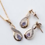 A SUITE OF TANZANITE JEWELLERY Comprising: a pendant, chain and earrings in 9ct yellow gold (3)
