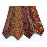 A GROUP OF THREE GENTLEMAN'S YVES SAINT LAURENT TIES And a Givenchy tie *NOTE: This lot is located