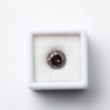 A ROUND BRILLIANT-CUT DIAMOND 1,19 CARATS Light cognac colour, SI clarity