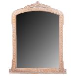 A CARVED AND GILDED CONSOLE MIRROR, 20TH CENTURY The arched frame with leaf-carved cresting above