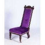 A VICTORIAN MAHOGANY PRIE DIEU The rectangular form flanked by twist-turned columns with a purple
