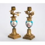 A PAIR OF SEVRES-STYLE PORCELAIN AND GILT-METAL CANDLESTICKS, LATE 19TH CENTURY The celeste bleu