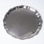 A CIRCULAR SILVER SALVER  Atkin Bros, Sheffield 1934, with shaped beaded border, engraved with a