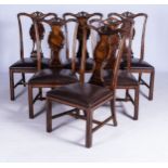 A SET OF SIX MAHOGANY CHIPPENDALE-STYLE DINING CHAIRS, 20TH CENTURY The shaped arched top rails
