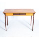 A CAPE YELLOWWOOD AND STINKWOOD PEG-TOPPED TABLE 19TH CENTURY The shaped rectangular top with