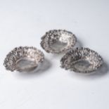 THREE SILVER SWEET DISHES  By different makers, Birmingham 1895 & 1896, heart-shaped with pierced