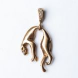 A GOLD LEOPARD PENDANT Pavé-set with 0,05 carats of round brilliant-cut diamonds, GH colour, VSSI