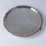 A SILVER SALVER LONDON, 1898  Josiah William and Co Circular with scrolled border on paw feet